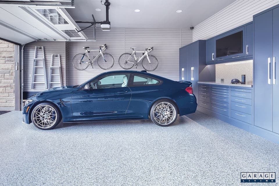 https://www.garageliving.com/hs-fs/hubfs/Imported_Blog_Media/blue-car-parked-in-garage-2.jpg?width=960&height=640&name=blue-car-parked-in-garage-2.jpg