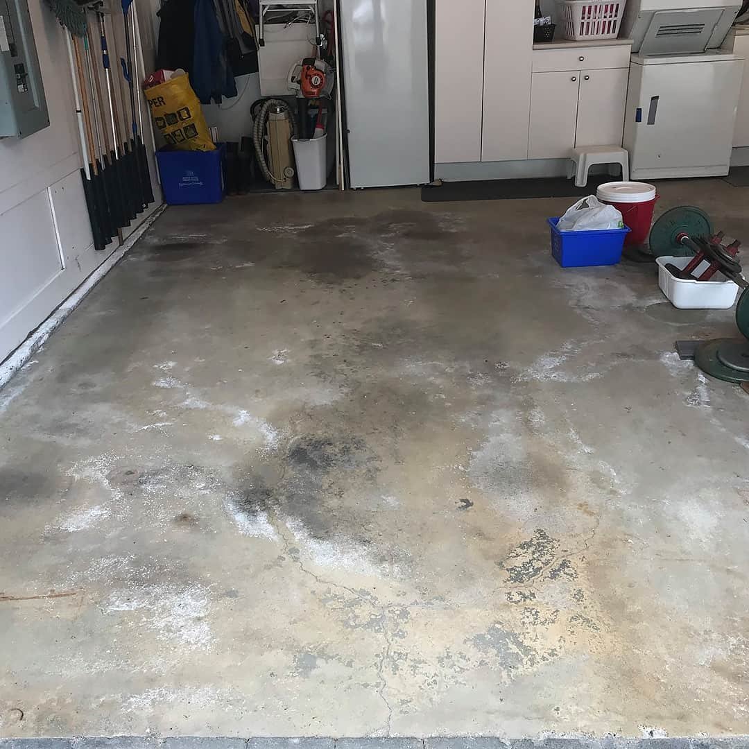 cracks in garage floor around drain cover