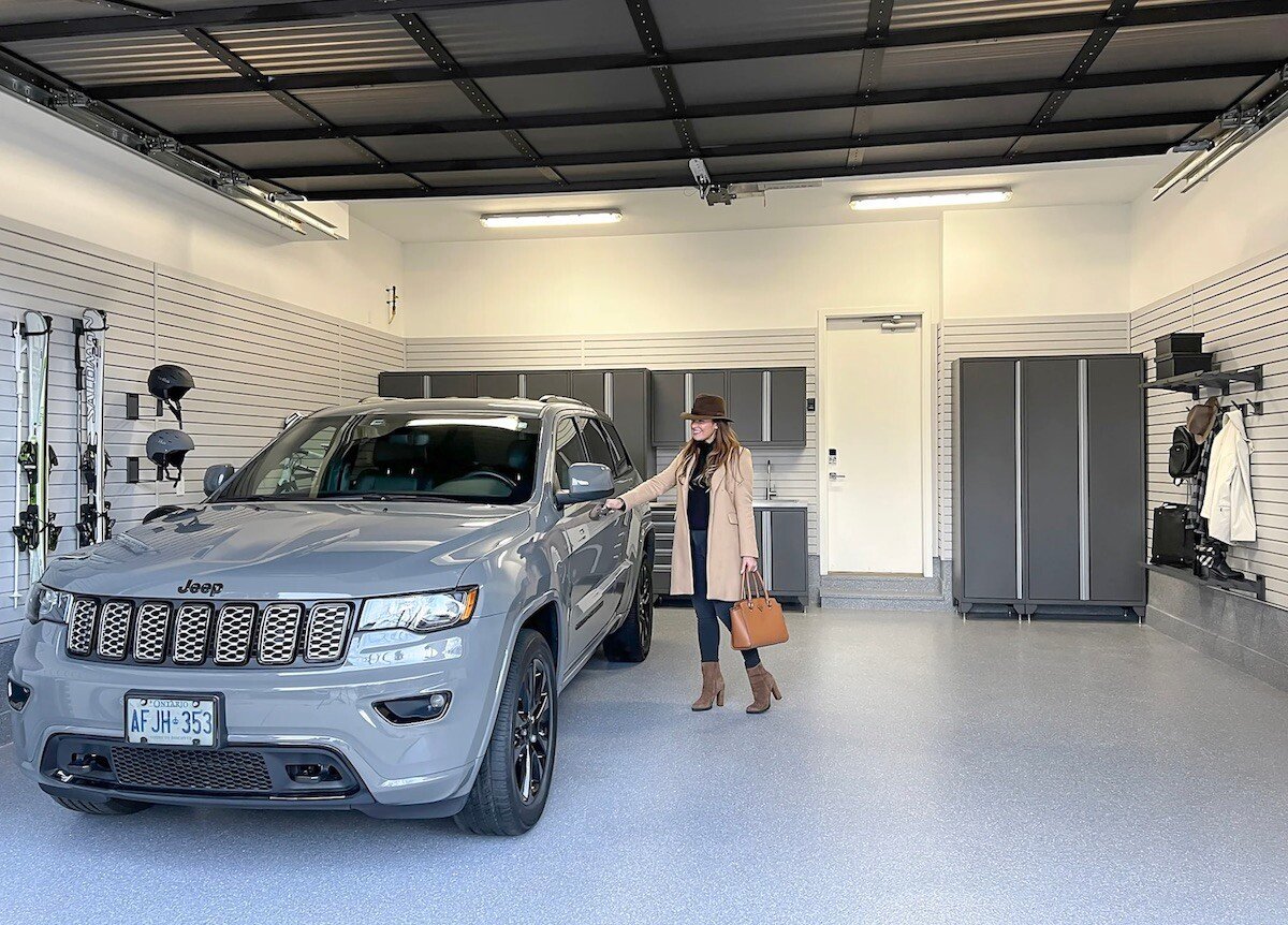 woman entering vehicle in garage